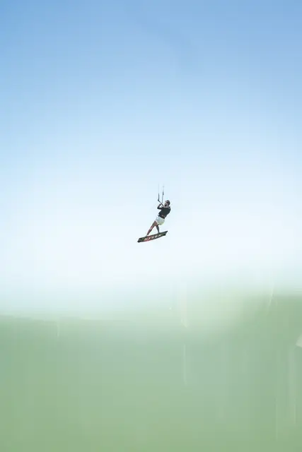 Kitesurf rider in action, photo by Olivier Schmitt