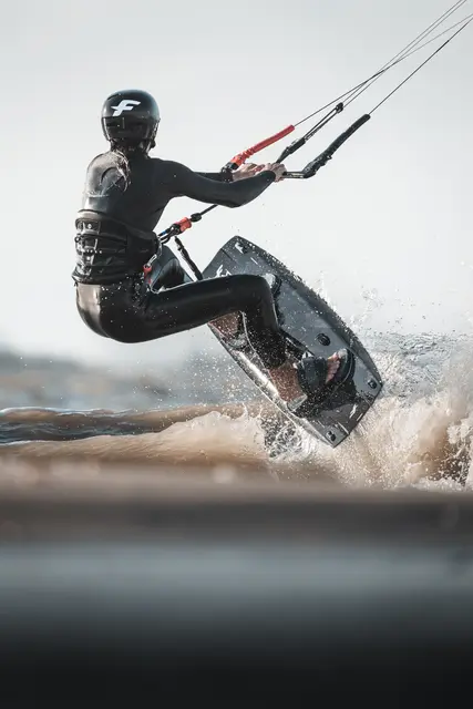 Kitesurf rider in action, photo by Olivier Schmitt
